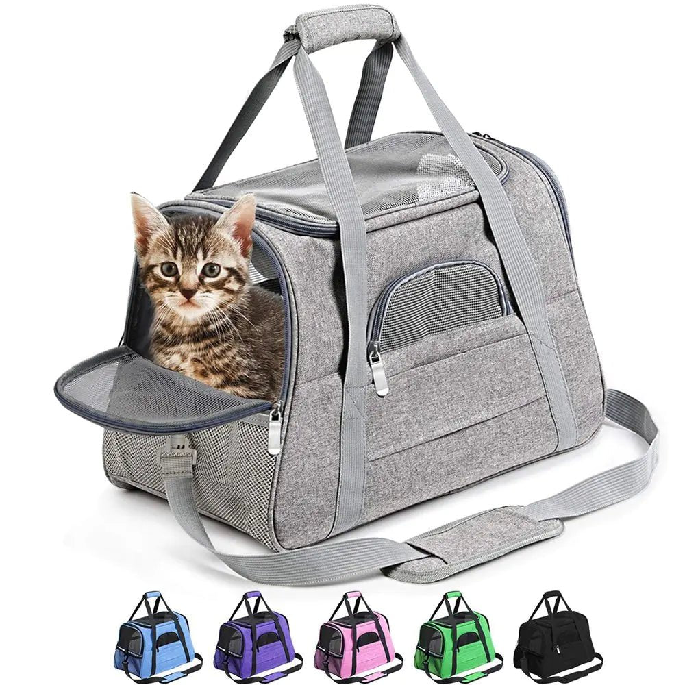 Pet messenger carrier travel bag with breathable mesh windows, soft-sided construction, and an adjustable shoulder strap for comfortable pet travel